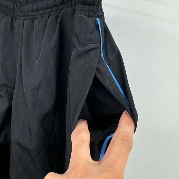 Nike The Athletic Dept. Women's size L Cropped Track Pants Mesh Lined Black - Picture 2 of 9